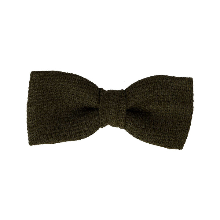 Dark green knitted bow tie on a white background