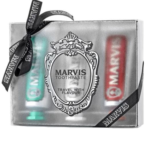 Marvis toothpaste travel set with two tubes and a decorative mirror in a clear box.